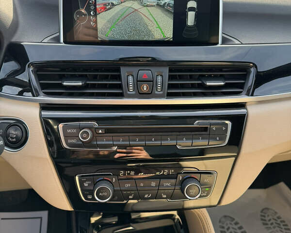 Коричневый БМВ Х1, объемом двигателя 2 л и пробегом 148 тыс. км за 17999 $, фото 43 на Automoto.ua