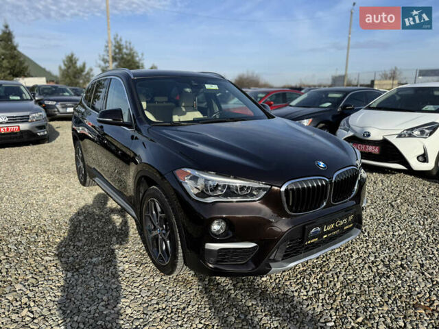 Коричневый БМВ Х1, объемом двигателя 2 л и пробегом 148 тыс. км за 17999 $, фото 2 на Automoto.ua