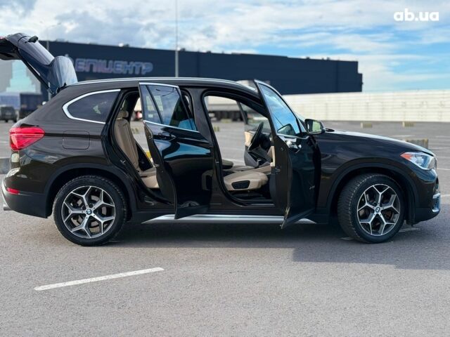 Коричневий БМВ Х1, об'ємом двигуна 2 л та пробігом 194 тис. км за 16990 $, фото 25 на Automoto.ua