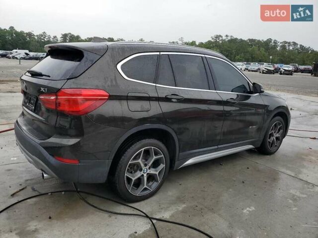 Коричневый БМВ Х1, объемом двигателя 2 л и пробегом 100 тыс. км за 3000 $, фото 2 на Automoto.ua
