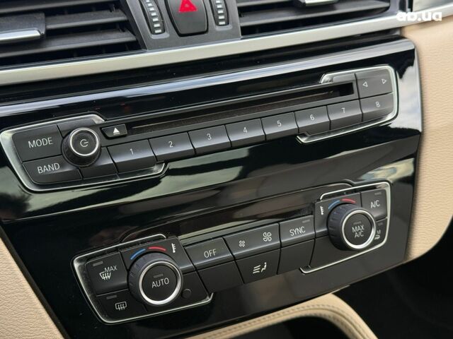 Коричневий БМВ Х1, об'ємом двигуна 2 л та пробігом 194 тис. км за 16990 $, фото 18 на Automoto.ua