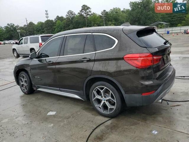 Коричневый БМВ Х1, объемом двигателя 2 л и пробегом 100 тыс. км за 3000 $, фото 1 на Automoto.ua