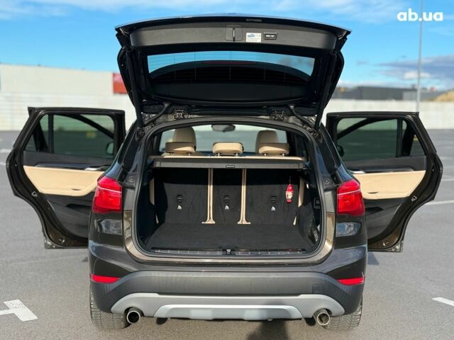 Коричневий БМВ Х1, об'ємом двигуна 2 л та пробігом 194 тис. км за 16990 $, фото 28 на Automoto.ua