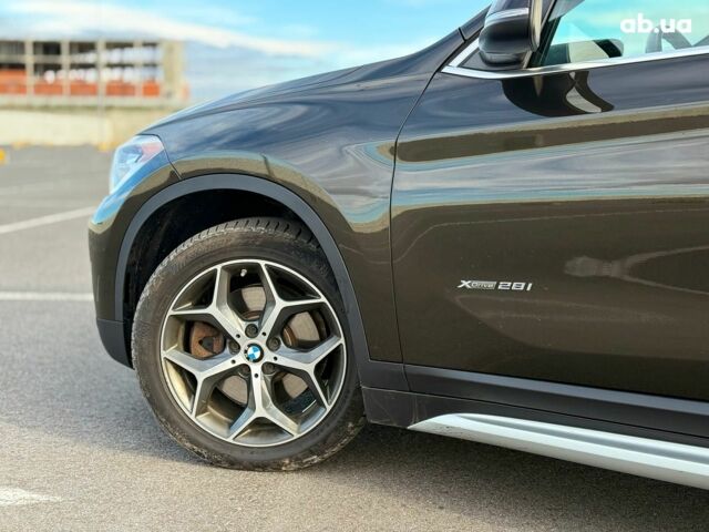Коричневий БМВ Х1, об'ємом двигуна 2 л та пробігом 194 тис. км за 16990 $, фото 11 на Automoto.ua