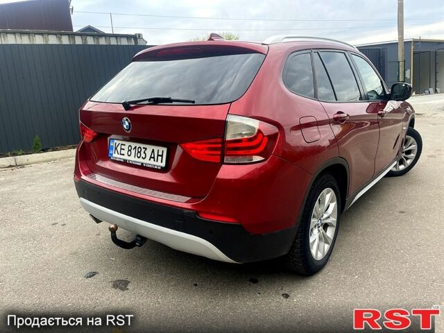 Красный БМВ Х1, объемом двигателя 2 л и пробегом 400 тыс. км за 12000 $, фото 4 на Automoto.ua