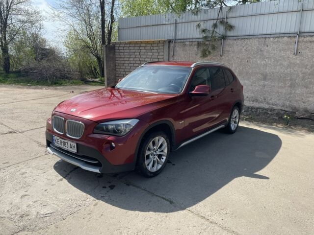 Красный БМВ Х1, объемом двигателя 2 л и пробегом 398 тыс. км за 12500 $, фото 1 на Automoto.ua