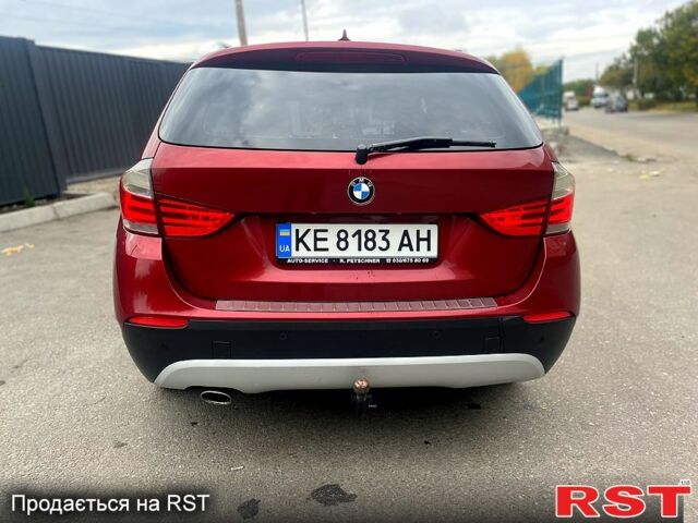 Красный БМВ Х1, объемом двигателя 2 л и пробегом 400 тыс. км за 12000 $, фото 5 на Automoto.ua