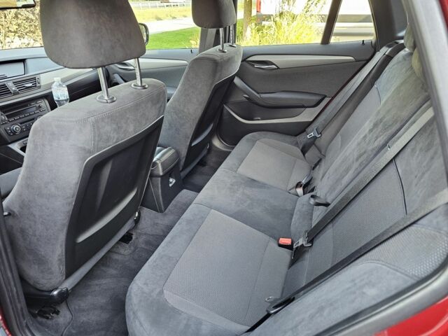 Красный БМВ Х1, объемом двигателя 2 л и пробегом 55 тыс. км за 18500 $, фото 4 на Automoto.ua