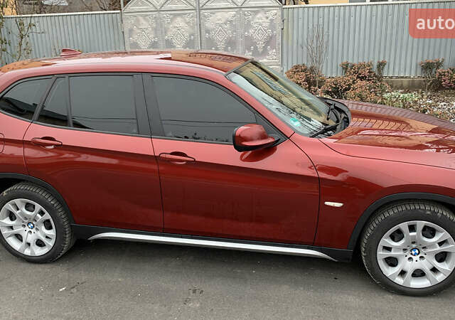 Красный БМВ Х1, объемом двигателя 2 л и пробегом 245 тыс. км за 10999 $, фото 2 на Automoto.ua