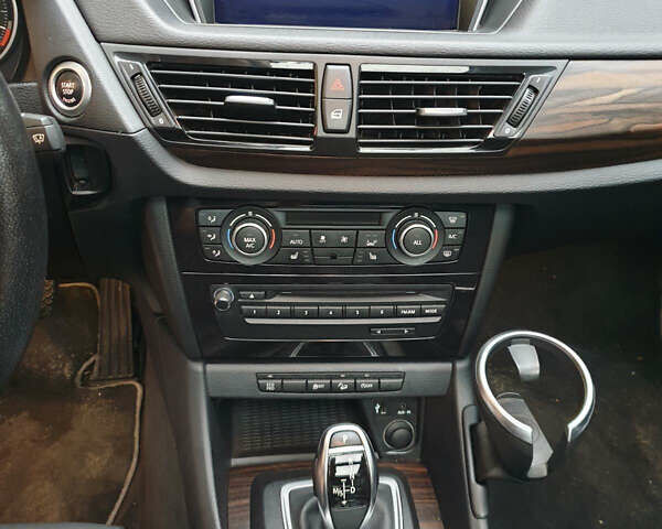 Червоний БМВ Х1, об'ємом двигуна 2 л та пробігом 215 тис. км за 14500 $, фото 5 на Automoto.ua