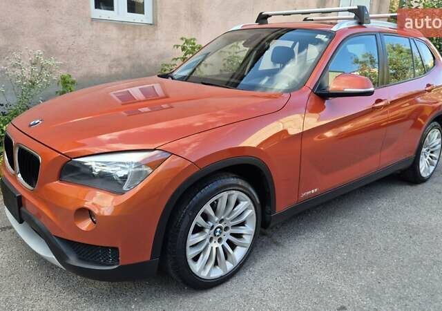 Красный БМВ Х1, объемом двигателя 2 л и пробегом 200 тыс. км за 12000 $, фото 6 на Automoto.ua