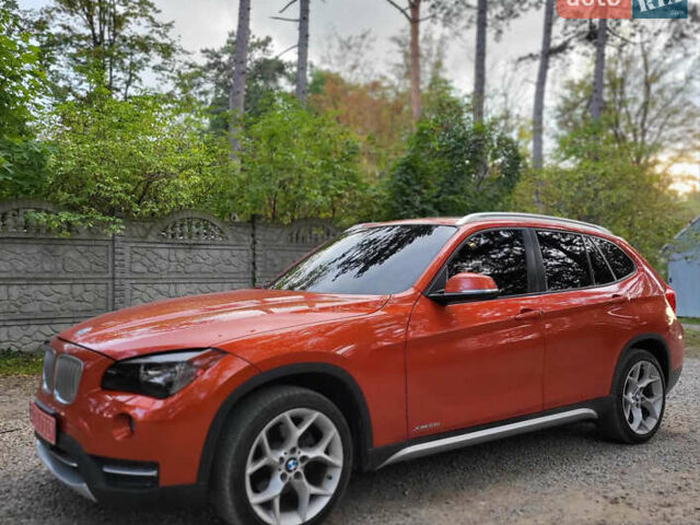 Червоний БМВ Х1, об'ємом двигуна 2 л та пробігом 215 тис. км за 14500 $, фото 1 на Automoto.ua
