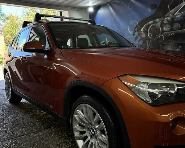 Красный БМВ Х1, объемом двигателя 2 л и пробегом 200 тыс. км за 12000 $, фото 17 на Automoto.ua
