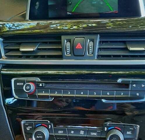 Красный БМВ Х1, объемом двигателя 2 л и пробегом 46 тыс. км за 23000 $, фото 16 на Automoto.ua