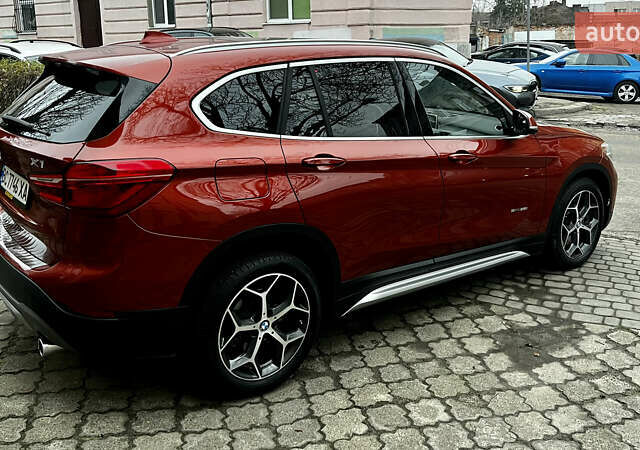 Красный БМВ Х1, объемом двигателя 2 л и пробегом 84 тыс. км за 17800 $, фото 2 на Automoto.ua