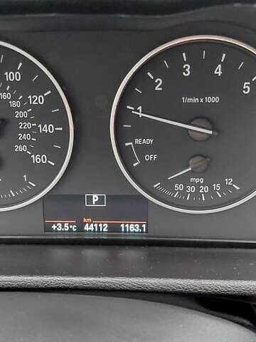 Красный БМВ Х1, объемом двигателя 2 л и пробегом 46 тыс. км за 23000 $, фото 1 на Automoto.ua