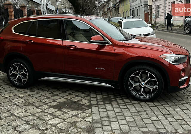 Красный БМВ Х1, объемом двигателя 2 л и пробегом 84 тыс. км за 17800 $, фото 1 на Automoto.ua