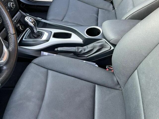 Серый БМВ Х1, объемом двигателя 2 л и пробегом 230 тыс. км за 6900 $, фото 7 на Automoto.ua