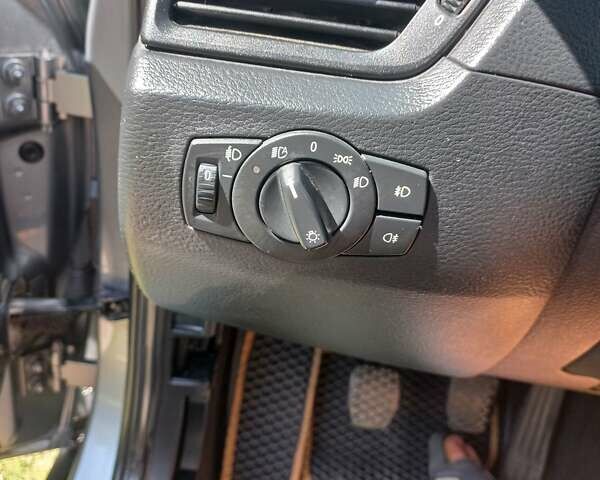 Серый БМВ Х1, объемом двигателя 2 л и пробегом 257 тыс. км за 11300 $, фото 19 на Automoto.ua