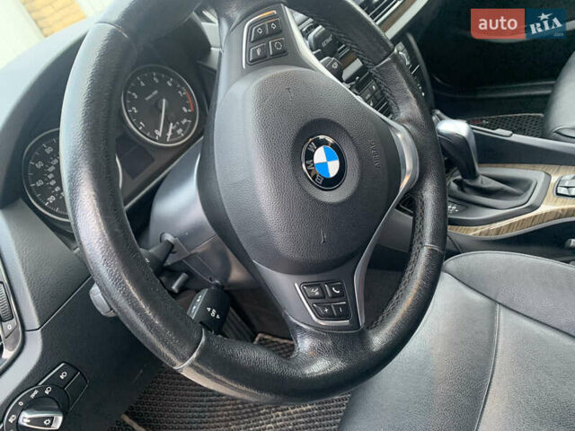 Серый БМВ Х1, объемом двигателя 3 л и пробегом 148 тыс. км за 11500 $, фото 10 на Automoto.ua