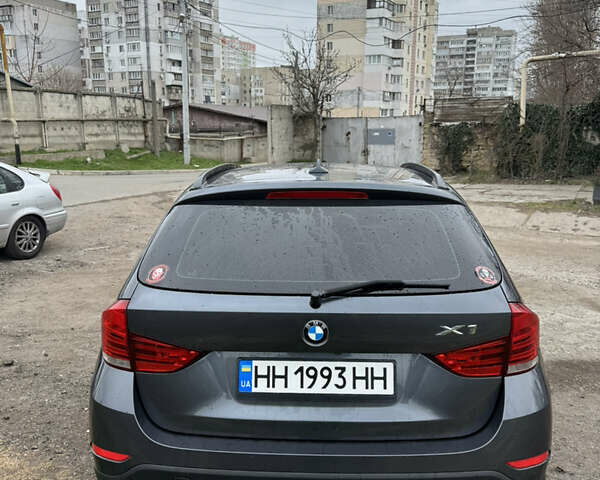 Серый БМВ Х1, объемом двигателя 2 л и пробегом 179 тыс. км за 14000 $, фото 4 на Automoto.ua