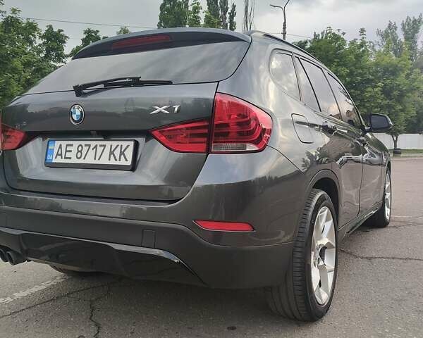 Сірий БМВ Х1, об'ємом двигуна 2 л та пробігом 143 тис. км за 13300 $, фото 10 на Automoto.ua