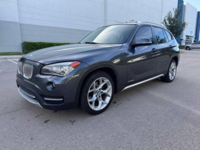 Серый БМВ Х1, объемом двигателя 2 л и пробегом 82 тыс. км за 12000 $, фото 2 на Automoto.ua