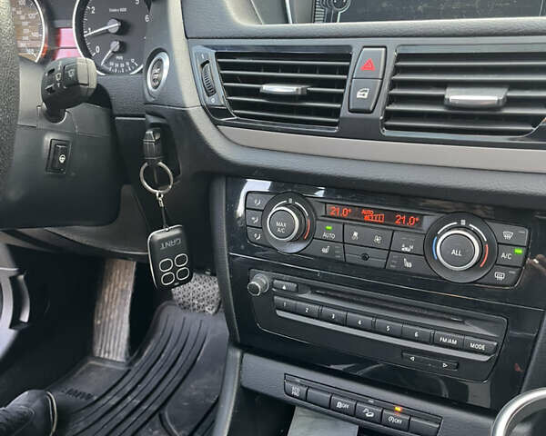 Серый БМВ Х1, объемом двигателя 2 л и пробегом 145 тыс. км за 11900 $, фото 6 на Automoto.ua