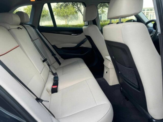 Серый БМВ Х1, объемом двигателя 2 л и пробегом 82 тыс. км за 12000 $, фото 12 на Automoto.ua