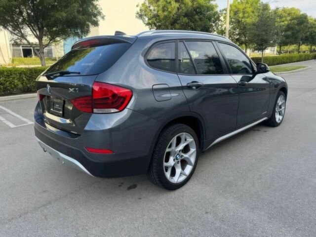 Серый БМВ Х1, объемом двигателя 2 л и пробегом 82 тыс. км за 12000 $, фото 6 на Automoto.ua