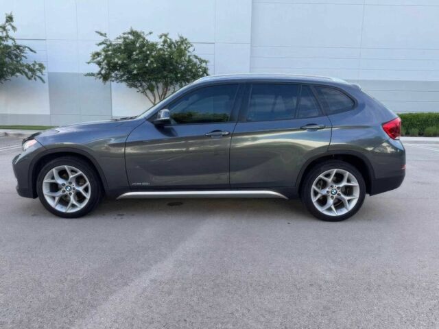 Серый БМВ Х1, объемом двигателя 2 л и пробегом 82 тыс. км за 12000 $, фото 3 на Automoto.ua