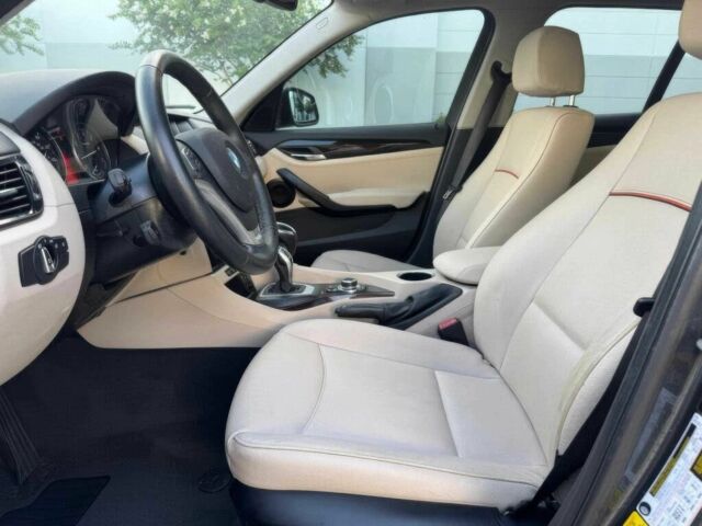 Серый БМВ Х1, объемом двигателя 2 л и пробегом 82 тыс. км за 12000 $, фото 9 на Automoto.ua