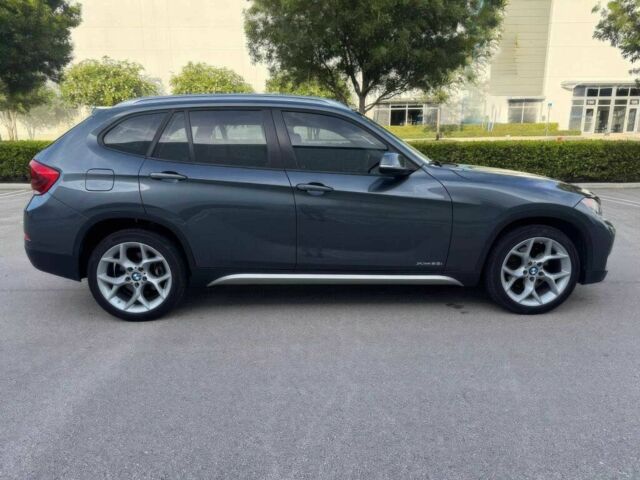 Серый БМВ Х1, объемом двигателя 2 л и пробегом 82 тыс. км за 12000 $, фото 7 на Automoto.ua