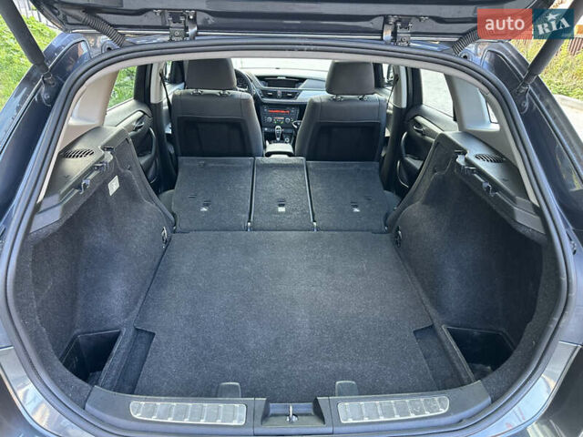 Сірий БМВ Х1, об'ємом двигуна 2 л та пробігом 158 тис. км за 12900 $, фото 26 на Automoto.ua