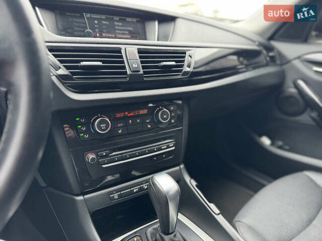 Серый БМВ Х1, объемом двигателя 2.98 л и пробегом 249 тыс. км за 12400 $, фото 11 на Automoto.ua