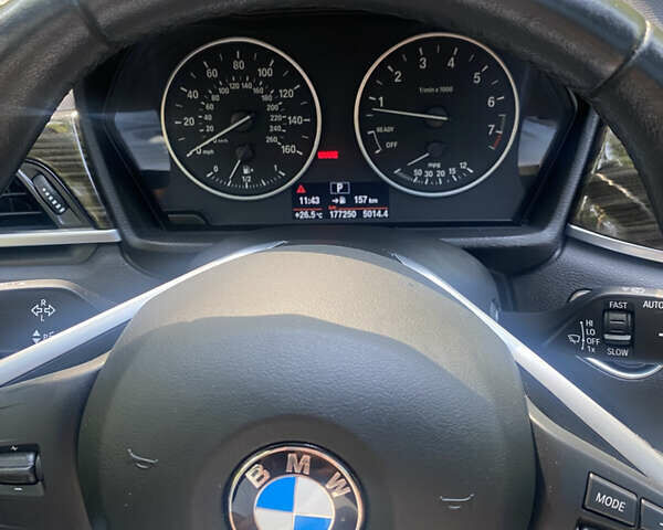 Сірий БМВ Х1, об'ємом двигуна 2 л та пробігом 177 тис. км за 18499 $, фото 19 на Automoto.ua