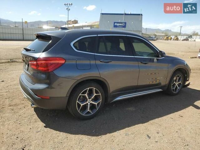 Серый БМВ Х1, объемом двигателя 2 л и пробегом 100 тыс. км за 3000 $, фото 2 на Automoto.ua