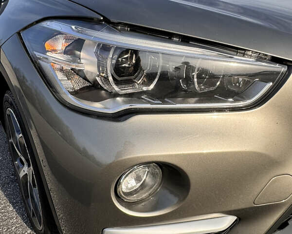 Серый БМВ Х1, объемом двигателя 2 л и пробегом 211 тыс. км за 19500 $, фото 3 на Automoto.ua