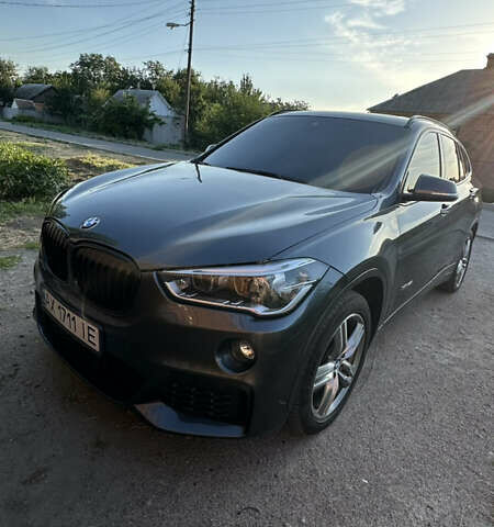 Серый БМВ Х1, объемом двигателя 2 л и пробегом 160 тыс. км за 22000 $, фото 2 на Automoto.ua