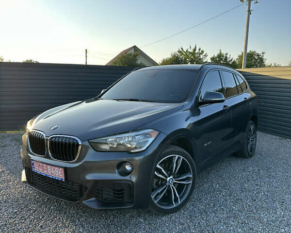 Серый БМВ Х1, объемом двигателя 2 л и пробегом 99 тыс. км за 18650 $, фото 3 на Automoto.ua