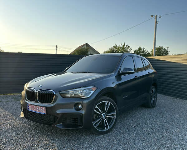 Серый БМВ Х1, объемом двигателя 2 л и пробегом 99 тыс. км за 18650 $, фото 1 на Automoto.ua