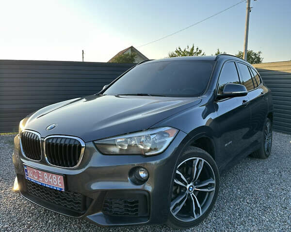Серый БМВ Х1, объемом двигателя 2 л и пробегом 99 тыс. км за 18650 $, фото 2 на Automoto.ua