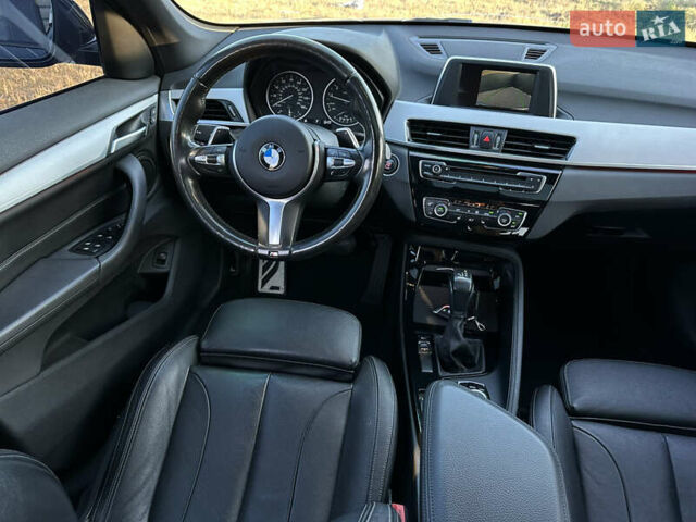 Серый БМВ Х1, объемом двигателя 2 л и пробегом 99 тыс. км за 18650 $, фото 23 на Automoto.ua