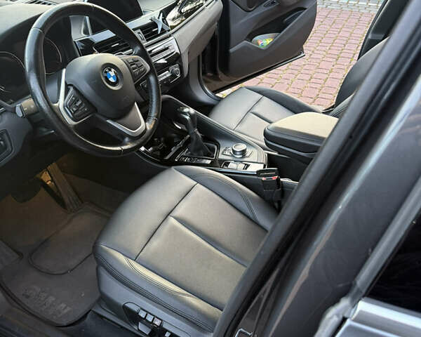 Серый БМВ Х1, объемом двигателя 2 л и пробегом 180 тыс. км за 20500 $, фото 2 на Automoto.ua