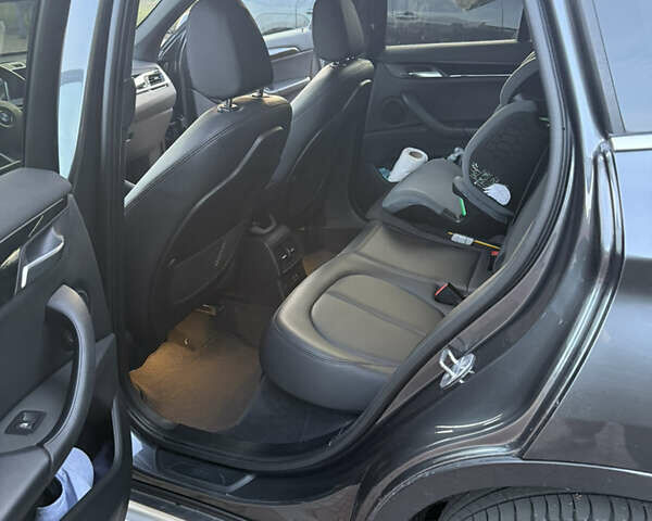 Серый БМВ Х1, объемом двигателя 2 л и пробегом 180 тыс. км за 20500 $, фото 3 на Automoto.ua