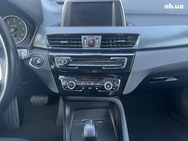 Сірий БМВ Х1, об'ємом двигуна 2 л та пробігом 110 тис. км за 22100 $, фото 9 на Automoto.ua