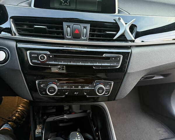 Серый БМВ Х1, объемом двигателя 2 л и пробегом 180 тыс. км за 20500 $, фото 4 на Automoto.ua