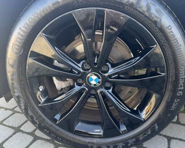 Серый БМВ Х1, объемом двигателя 2 л и пробегом 53 тыс. км за 29800 $, фото 4 на Automoto.ua