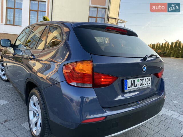 Синий БМВ Х1, объемом двигателя 2 л и пробегом 300 тыс. км за 8899 $, фото 47 на Automoto.ua