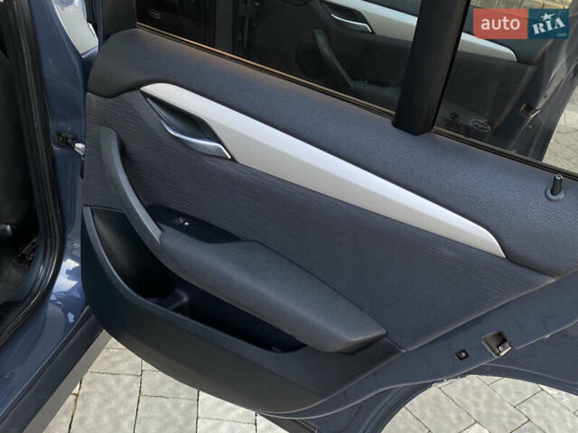 Синий БМВ Х1, объемом двигателя 2 л и пробегом 300 тыс. км за 8899 $, фото 66 на Automoto.ua